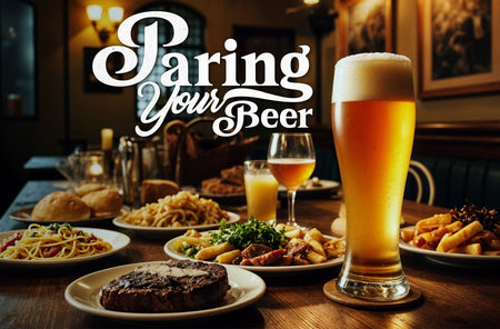 A tall glass of beer with various dishes like steak, pasta, and fries on a wooden table, with the text 